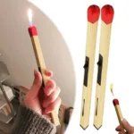 Hand holding long wooden matchstick lighter with red tip and open flame
