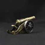 Antique Artillery Cannon Lighter standing upright on a surface