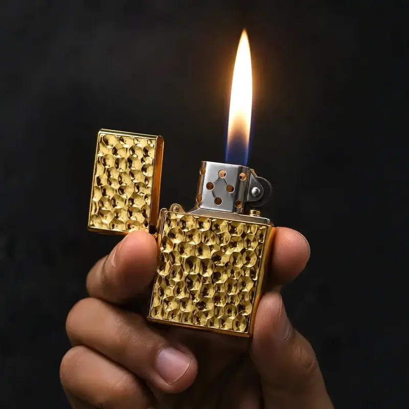 honeycomb metal zippo lighter Hand holding Premium Honeycomb Metal Lighter with soft flame