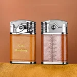 Close-up of brown leather-wrapped lighter showing gold “Less Smoking” text and its back side