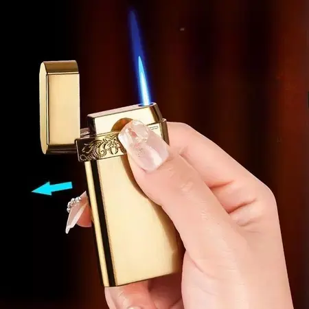Gold Torch Jet Flame Lighter-lighters.pk Personalized Gold Torch Lighter held in hand with blue jet flame lit
